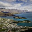 Views like this -- of Queenstown and Lake Wakatipu, with the Remarkables mountain range in the background -- are one of the reasons tourists flock to New Zealand. But strong economic growth is placing strains on the environment, the OECD is warning