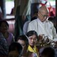 Taw Phaya (C), 93, grandson of King Thibaw, attends a ceremony with relatives at Mandalay's Golden Palace on November 22, 2016 to mark the exile anniversary of their royal ancestor