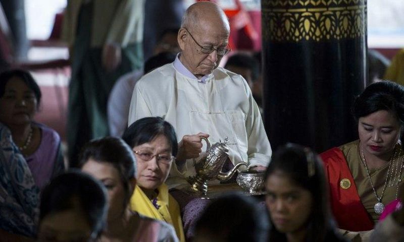 Taw Phaya (C), 93, grandson of King Thibaw, attends a ceremony with relatives at Mandalay's Golden Palace on November 22, 2016 to mark the exile anniversary of their royal ancestor