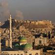 Smoke billows near Aleppo's historic citadel during fighting between Syrian regime forces and rebel fighters, on December 3, 2016