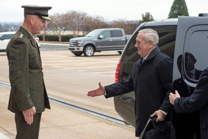 US Secretary of Defense James Mattis (R) arrives at the Pentagon on January 21, 2017