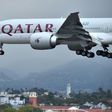 A Qatar Airways plane lands at Los Angeles International Airport