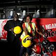 Pilsner Marketing Manager, Samuel Wasswa and Pilsner Senior Brand Manager, Truphena Malaki on the KBL/Pilsner bike to be worn
