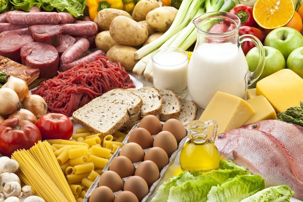 Table filled with different types of foods