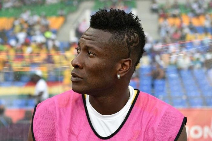 Ghana's forward Asamoah Gyan who is recovering from an injury sits on the bench during the 2017 Africa Cup of Nations quarter-final football match between DR Congo and Ghana in Oyem on January 29, 2017