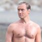 Jude Law's Beach Pope Bod Ignites Online Debate