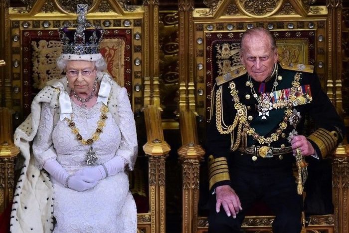 Britain's Queen Elizabeth II sits next to Prince Philip during the 2015 State Opening of Parliament at the Palace of Westminster in London
