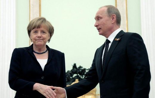 German Chancellor Angela Merkel will meet President Vladimir Putin (shown in this file photo from May 10, 2015 in Moscow) on Tuesday in her first visit to Russia since 2015 in a sign of renewed dialogue between Berlin and Moscow