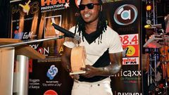 Rapper Timmy Tdat addresses fans after winning the Most Downloaded Hip Hop song in the Mdundo Music Awards.