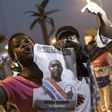 People celebrate the inauguration of new Gambia's President Adama Barrow at Westfield neighbourhood on January 19, 2017 in Banjul