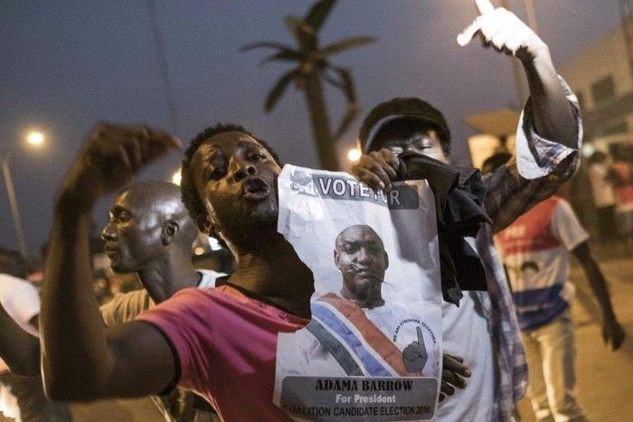 People celebrate the inauguration of new Gambia's President Adama Barrow at Westfield neighbourhood on January 19, 2017 in Banjul