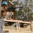 A Moroccan peacekeeper from the United Nations Mission in the Central African Republic (MINUSCA) patrols in Bangui on December 24, 2015 ahead the country presidential elections