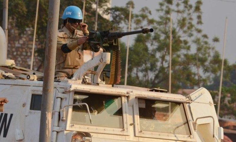 A Moroccan peacekeeper from the United Nations Mission in the Central African Republic (MINUSCA) patrols in Bangui on December 24, 2015 ahead the country presidential elections