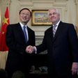 US Secretary of State Rex Tillerson (R) shakes hands with Chinese State Councilor Yang Jiechi before their meeting at the State Department in Washington,DC on February 28, 2017