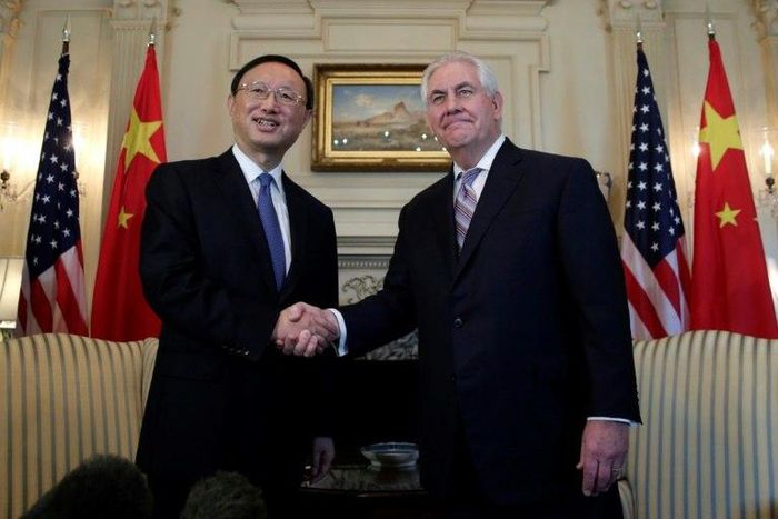 US Secretary of State Rex Tillerson (R) shakes hands with Chinese State Councilor Yang Jiechi before their meeting at the State Department in Washington,DC on February 28, 2017