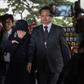 Choi Soon-Sil (C) is escorted to the Seoul Central District Prosecutor's Office, on October 31, 2016