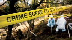 detectives at a crime scene