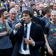 Chelsea's head coach Antonio Conte (C) talks during the presentation ceremony for the English Premier League trophy on May 21, 2017