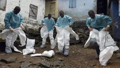 Medics gear up before interacting with Ebola patients in a West African State (CNN)