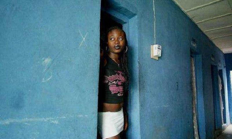 A commercial sex worker in a brothel