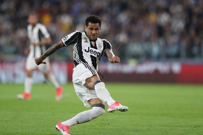 Juventus Defender Dani Alves kicks to score during the UEFA Champions League semi final second leg football match Juventus vs Monaco, on May 9, 2017