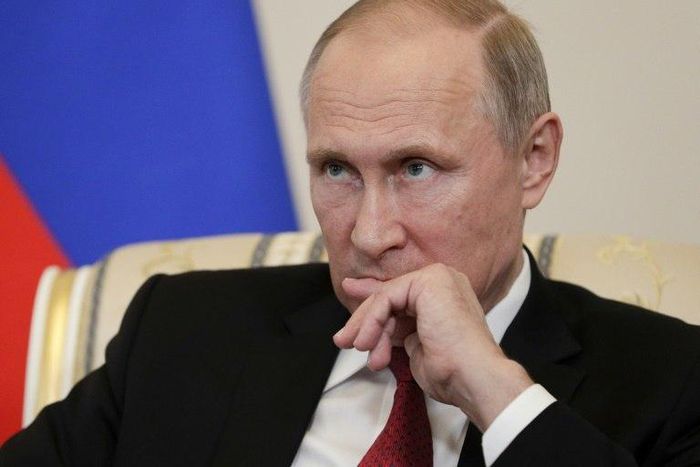 Russian President Vladimir Putin says US intelligence leaker Edward Snowden is "not a traitor"