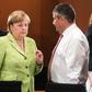 German Chancellor Angela Merkel (C), Interior Minister Thomas de Maiziere (L) and Vice Chancellor and Foreign Minister Sigmar Gabriel attend a meeting with the state Premiers of the German Federal states at the Chancellery on June 1, 2017