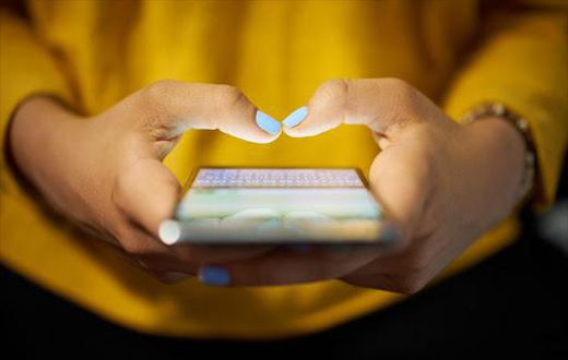 A person using their mobile phone (Twitter)