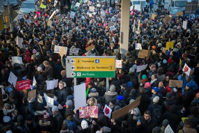 Demonstrators at JFK International Airport protest President Donald Trump's executive order suspending refugee arrivals and imposing tough controls on some travellers