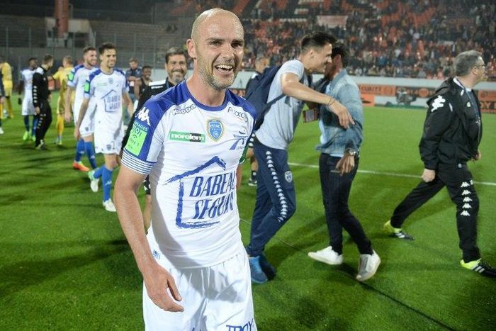 Troyes' midfielder Benjamin Nivet celebrates at the end of the play-off match against Lorient on May 28, 2017