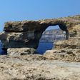 A picture taken on July 21, 2015 in Malta shows the Azure Window, a limestone arch on Gozo island