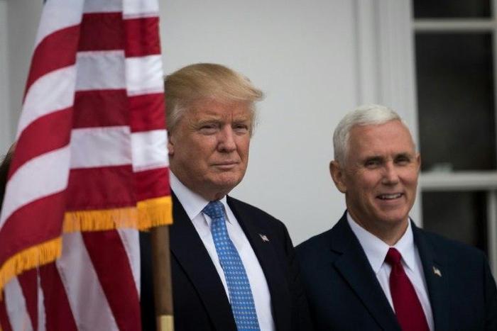 President-elect Donald Trump (L) and vice president-elect Mike Pence will visit an air conditioning plant in Indiana which he repeatedly leaned on in public not to ship a planned 2,000 jobs to Mexico