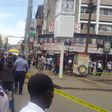 Nairobi residents look on as police cordon off an area along Latema Road where a suspicious box was left (Twitter)