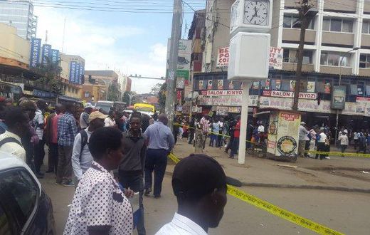 Nairobi residents look on as police cordon off an area along Latema Road where a suspicious box was left (Twitter)