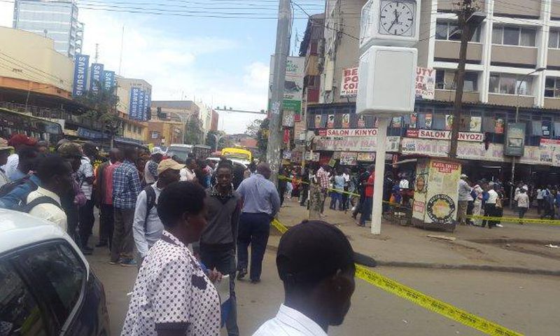 Nairobi residents look on as police cordon off an area along Latema Road where a suspicious box was left (Twitter)