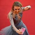 British singer Tallia Storm, who has 213,000 Instagram followers, poses for selfies on the red carpet at Cannes