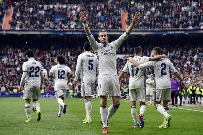 Real Madrid's forward Gareth Bale (C) celebrates a goal on February 18, 2017
