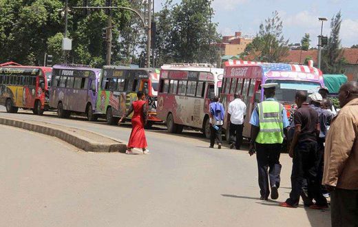 Public service vehicles parked outside Pangani police station