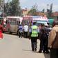 Public service vehicles parked outside Pangani police station