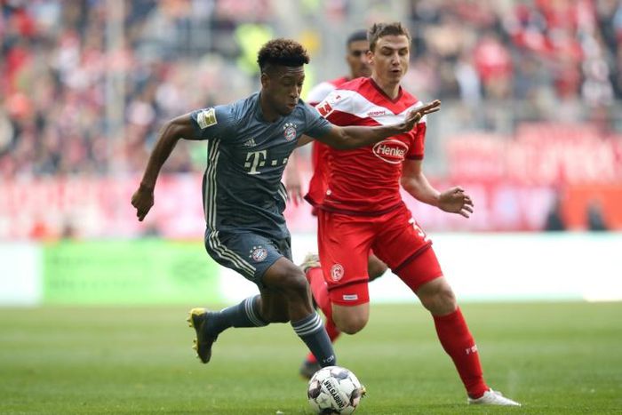 Kingsley Coman fired Bayern Munich back to the top of the Bundesliga on Sunday