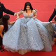Bollywood actress Aishwarya Rai Bachchan needed a team of five to help her up the stairs at Cannes