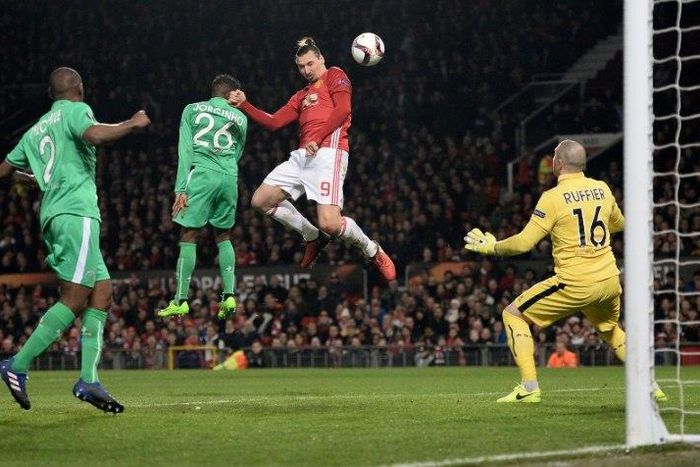 Manchester United's Zlatan Ibrahimovic (C) heads the ball to score but is ruled offside during their UEFA Europa League round of 32 first-leg match against Saint-Etienne, at Old Trafford stadium in Manchester, on February 16, 2017