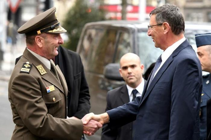 Israeli director-general of the Defense Ministry Udi Adam (R) shakes hands with Chief of General Staff of Croatian army Mirko Sundov prior to their meeting in which Adam said that Israel "could not...implement" the plan to sell F-16 jets to Croatia