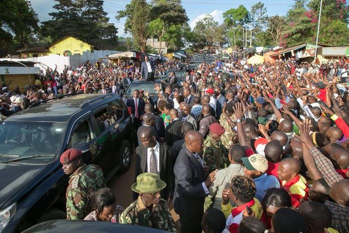 President Uhuru Kenyatta waves to supporters after he commissioned new medical equipment at Murang’a County Referral Hospital.