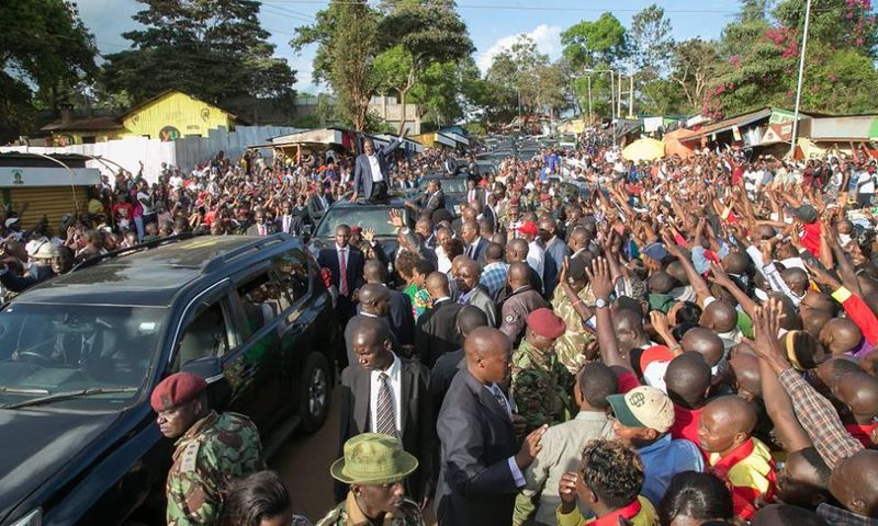 President Uhuru Kenyatta waves to supporters after he commissioned new medical equipment at Murang’a County Referral Hospital.