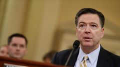 FBI Director James Comey testifies before the House Intelligence Committee hearing into alleged Russian meddling in the 2016 U.S. election, on Capitol Hill in Washington, U.S., March 20, 2017.