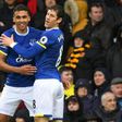 Everton's striker Dominic Calvert-Lewin (L) celebrates with midfielder Ross Barkley after scoring the opening goal of the English Premier League football match against Hull City March 18, 2017