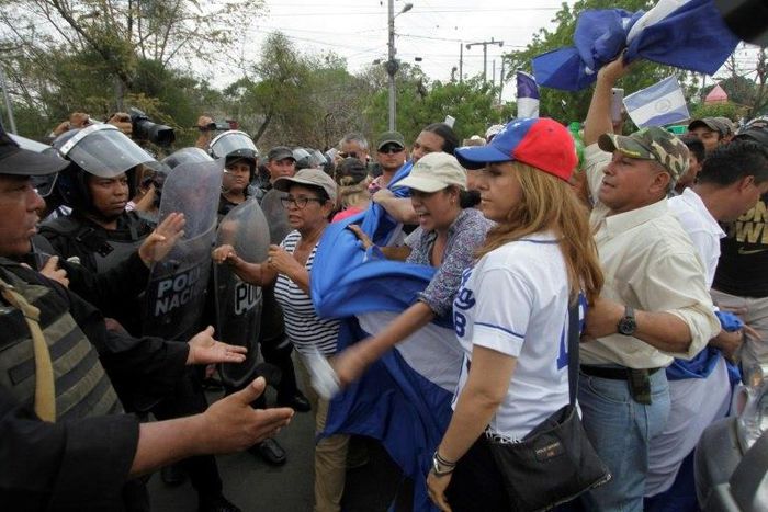 Nicaragua police prevented buses and trucks carrying protesters from converging in the town of Juigalpa, east of Managua as farmers tried to demonstrate against a planned canal