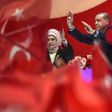 Turkish President Recep Tayyip Erdogan and his wife Emine Erdogan campaign at a rally on April 12, 2017