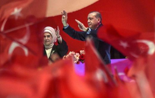 Turkish President Recep Tayyip Erdogan and his wife Emine Erdogan campaign at a rally on April 12, 2017